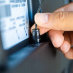 Plugging in the optical cable